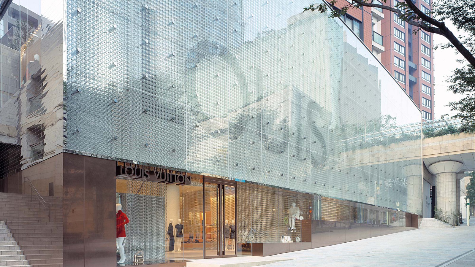 Louis Vuitton store Tokyo designed with perforated monogrammed facade